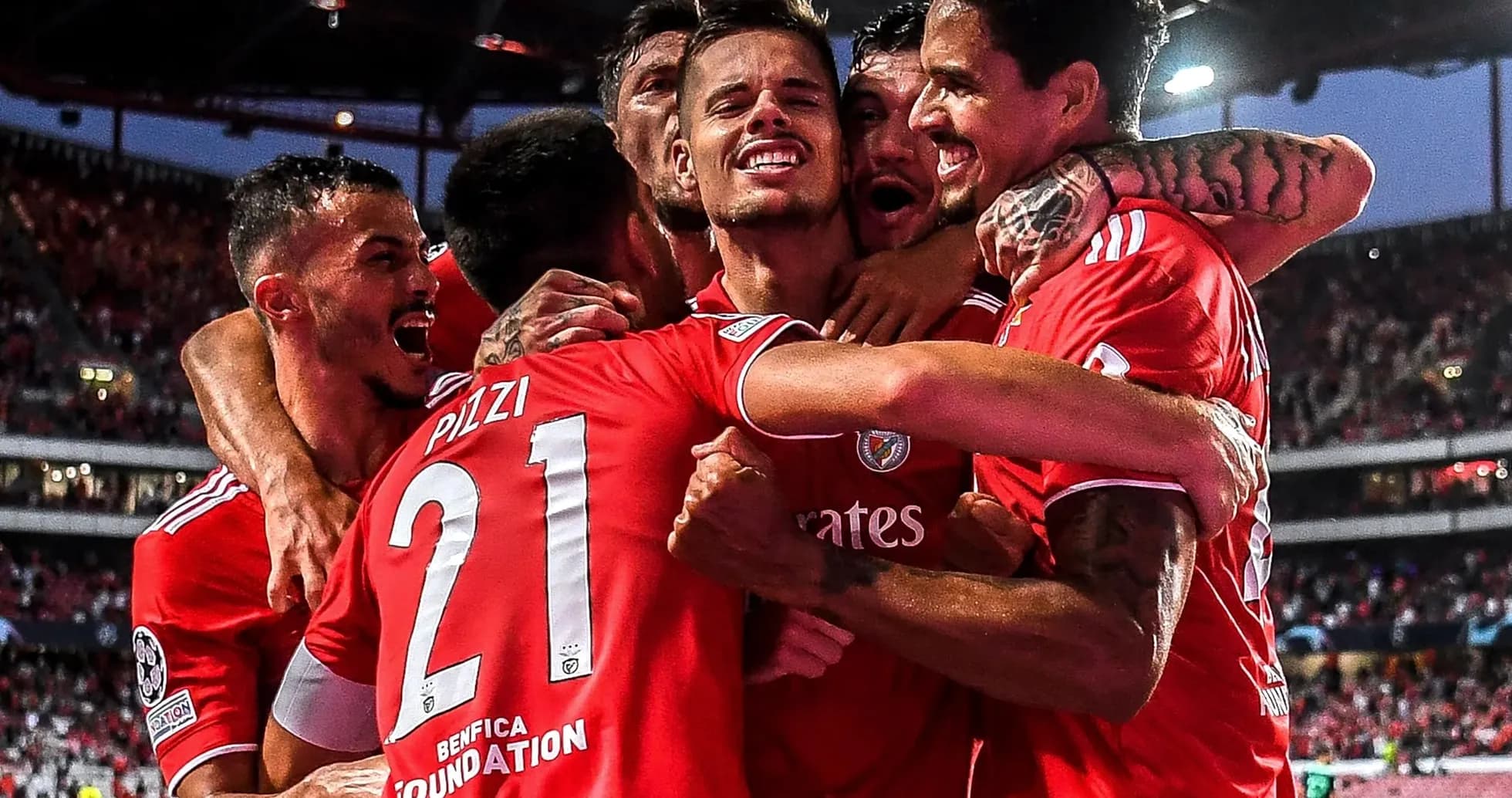 Benfica players celebrating a goal Benfica players celebrating a goal