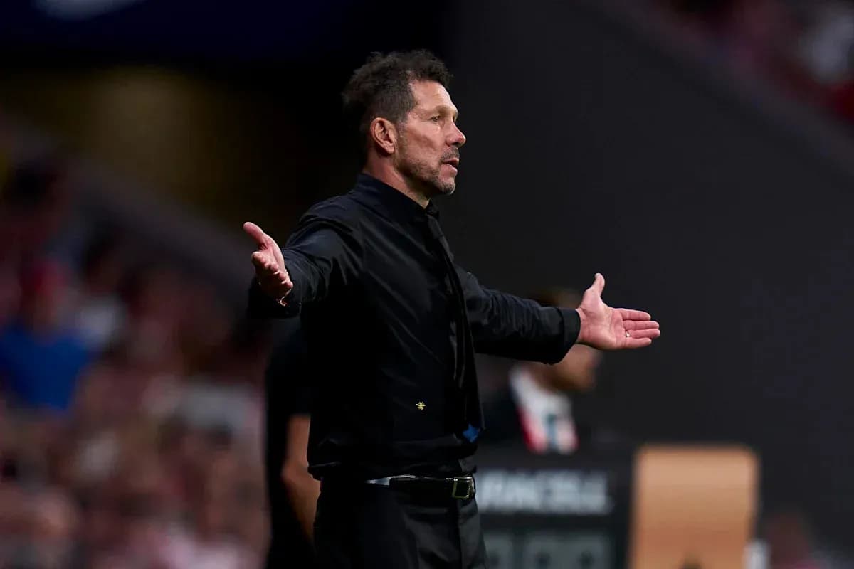 Coach gesturing during a match on the sidelines Coach gesturing during a match on the sidelines