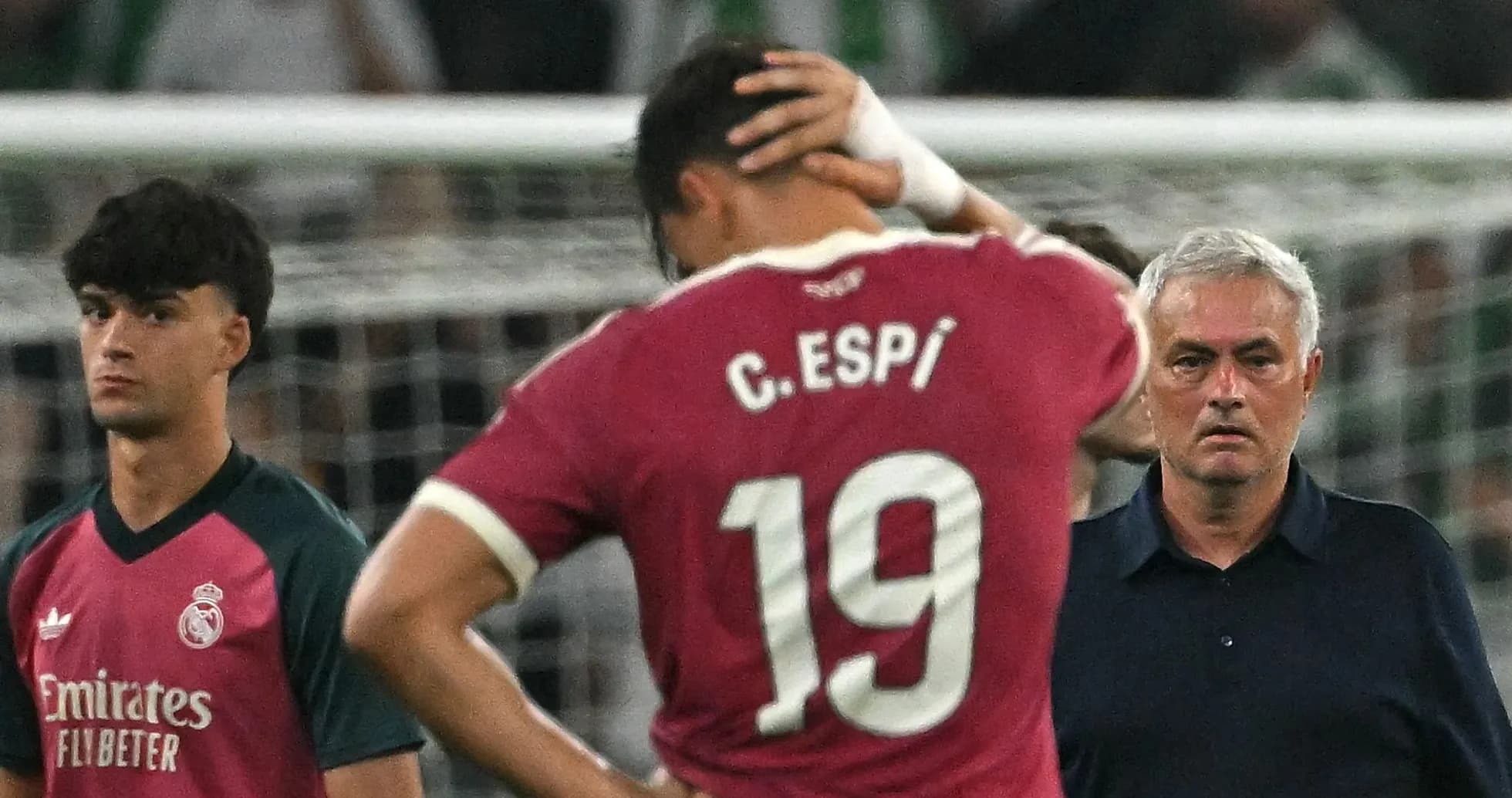 Players and manager reacting after match conclusion Players and manager reacting after match conclusion