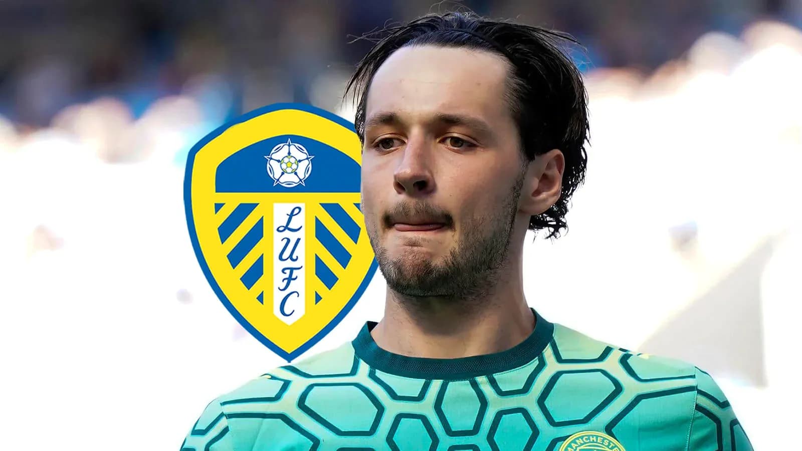 Player in goalkeeper jersey with Leeds United logo Player in goalkeeper jersey with Leeds United logo