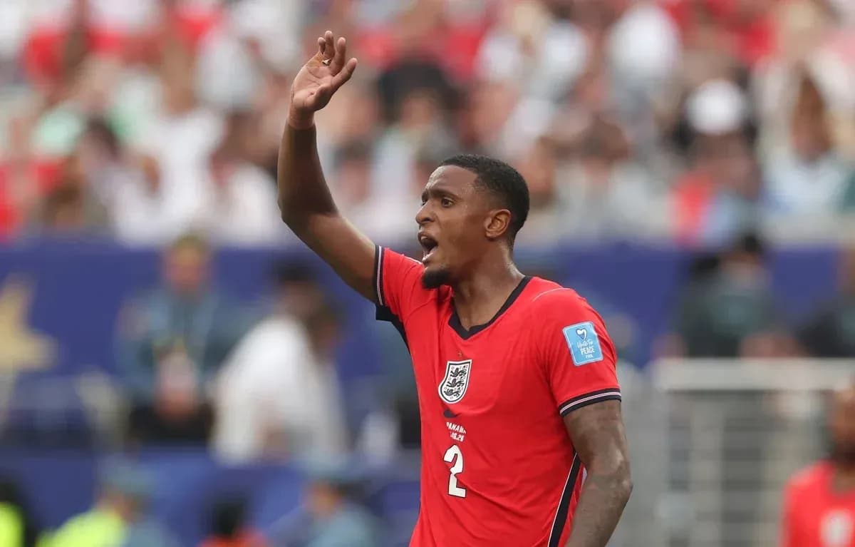 Player gesturing during a football match Player gesturing during a football match