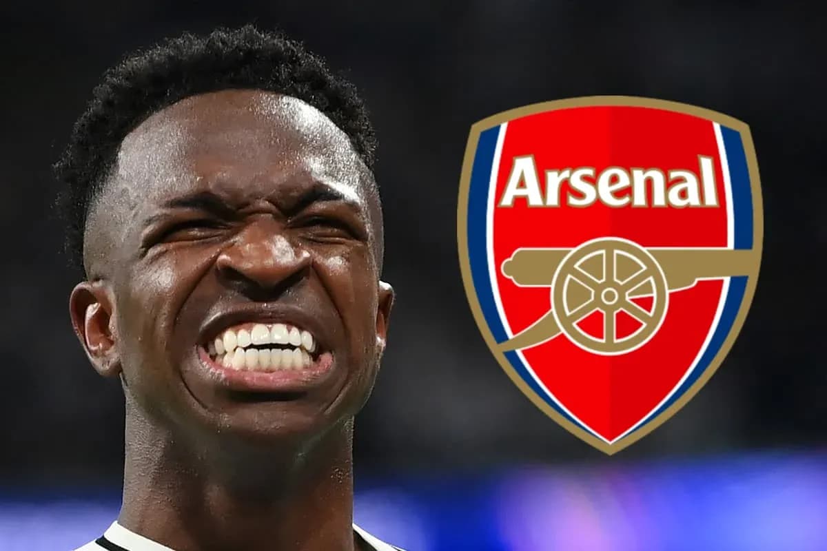 Player celebrating with Arsenal logo in background Player celebrating with Arsenal logo in background