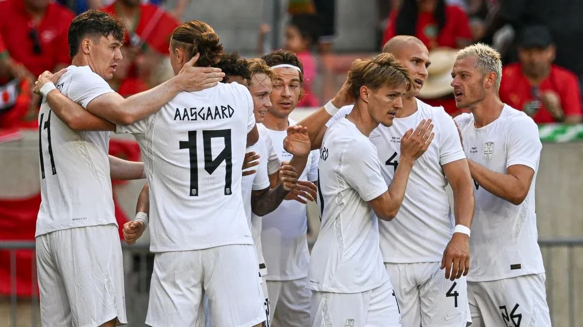 Players celebrating a goal during a match Players celebrating a goal during a match