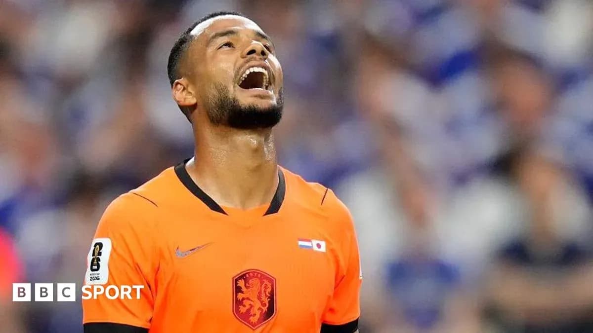 Player in orange kit reacting during a match Player in orange kit reacting during a match