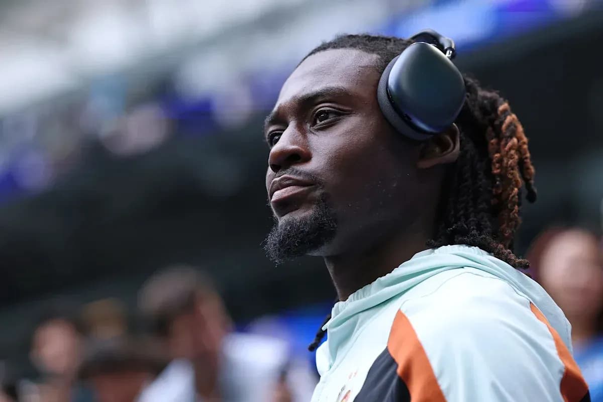 Player wearing headphones before the match Player wearing headphones before the match