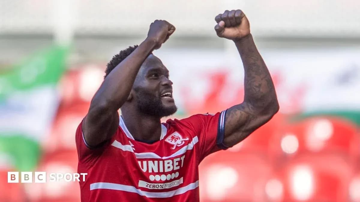 Player celebrating a goal with raised fists Player celebrating a goal with raised fists