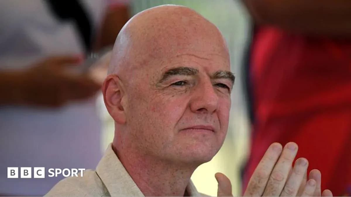 Man with bald head sitting outdoors, hands clasped Man with bald head sitting outdoors, hands clasped