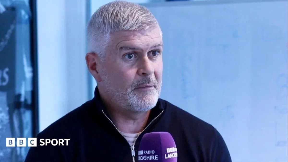 Man speaking during an interview in studio Man speaking during an interview in studio
