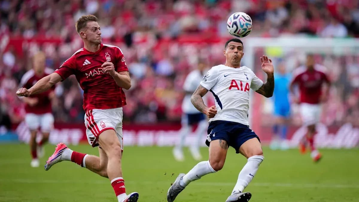 Player attempting to control the ball during match Player attempting to control the ball during match