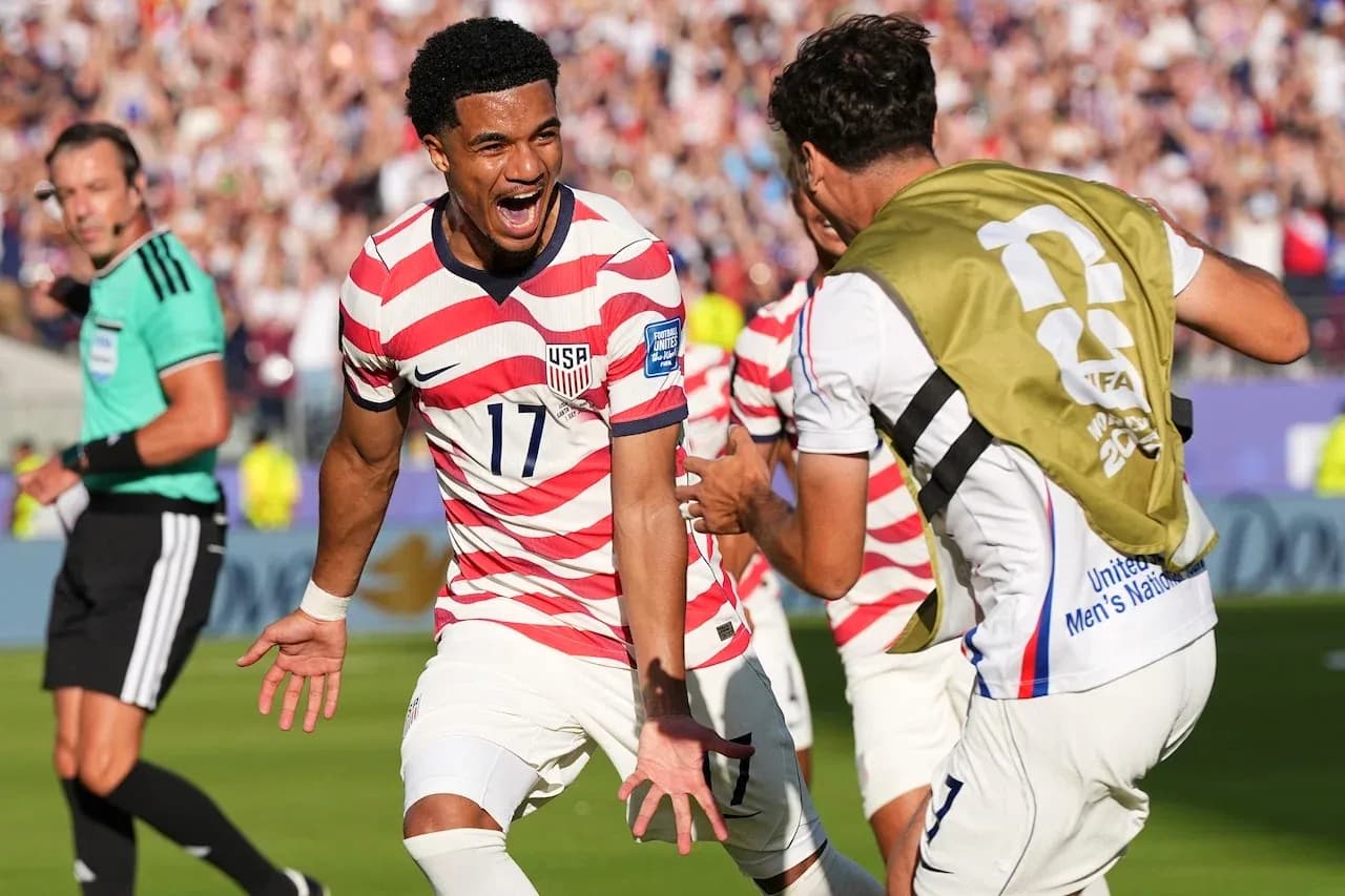 USA players celebrating a goal during World Cup match USA players celebrating a goal during World Cup match