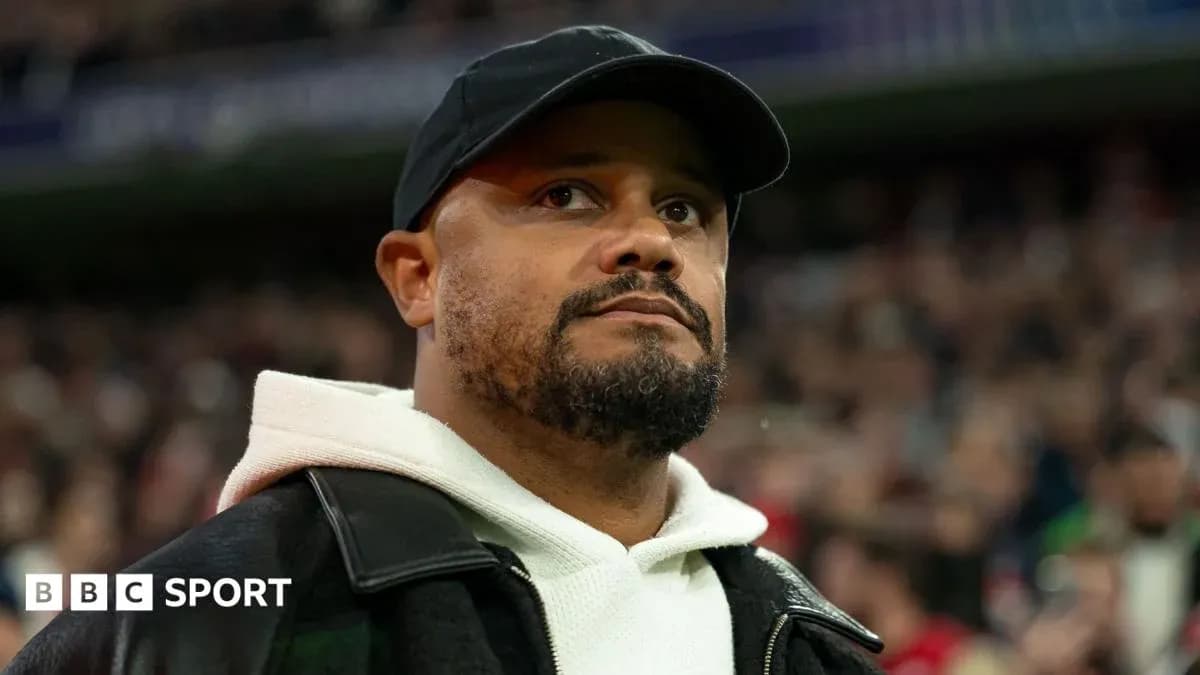 Person in a black cap at a sports event Person in a black cap at a sports event