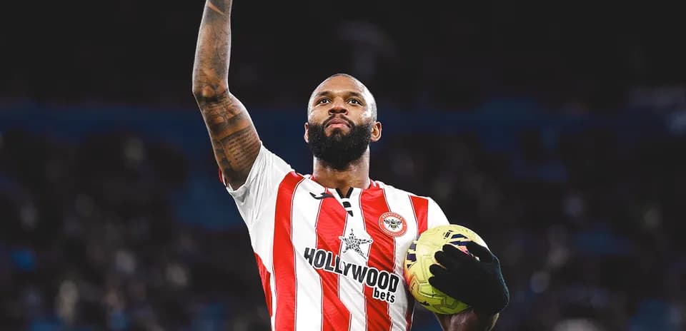 Brentford player celebrating with football Brentford player celebrating with football