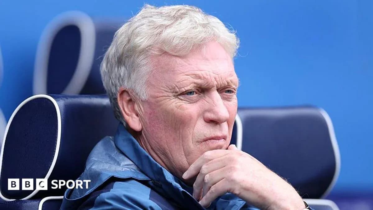 Coach sitting on bench during a match Coach sitting on bench during a match