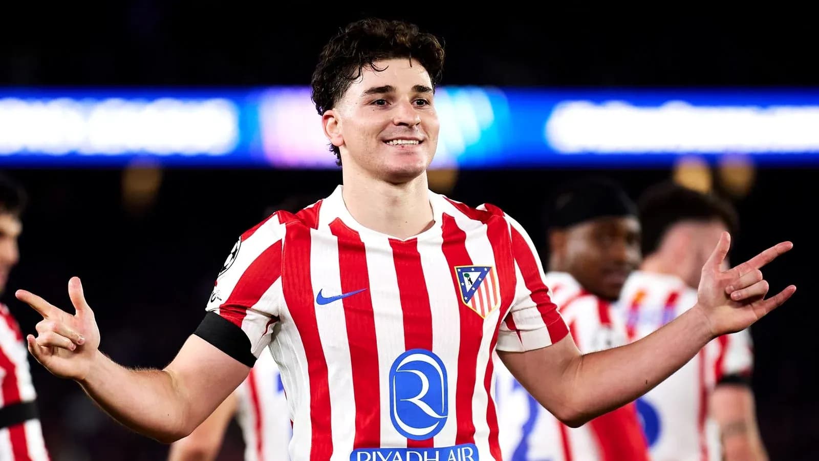 Player celebrating in Atletico Madrid jersey Player celebrating in Atletico Madrid jersey