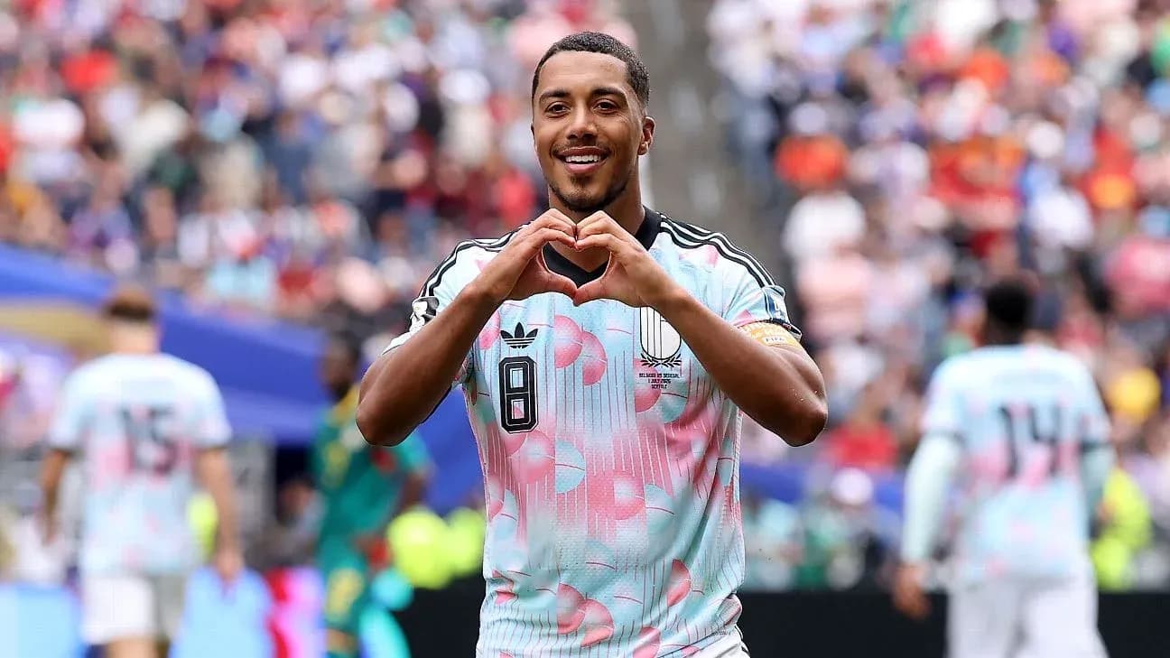 Player celebrating with heart gesture after scoring Player celebrating with heart gesture after scoring