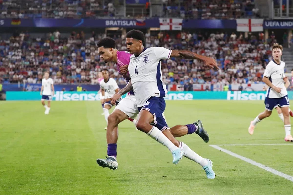 Players competing for the ball during a match Players competing for the ball during a match