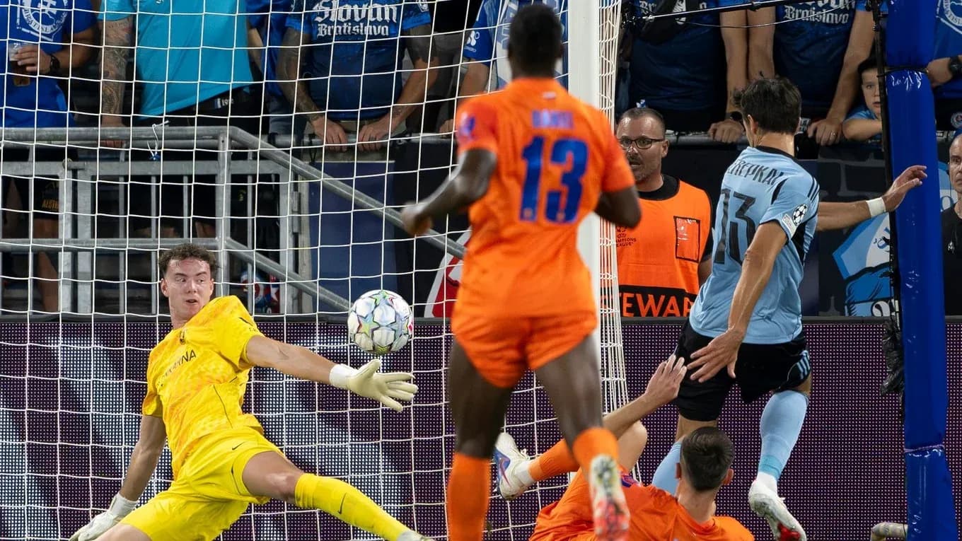 Slovan Bratislava goalkeeper making a crucial save Slovan Bratislava goalkeeper making a crucial save