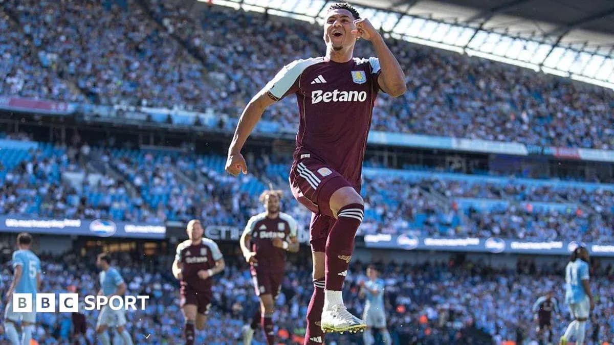Aston Villa player celebrating a goal at stadium Aston Villa player celebrating a goal at stadium