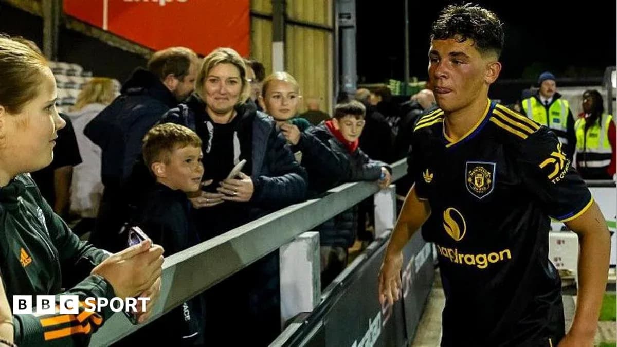 Player walking past fans after the match Player walking past fans after the match