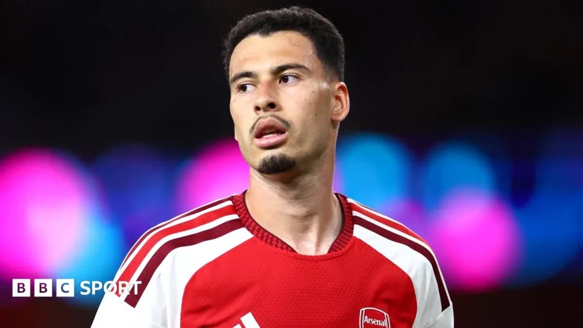 Arsenal player during a match with blurred background Arsenal player during a match with blurred background