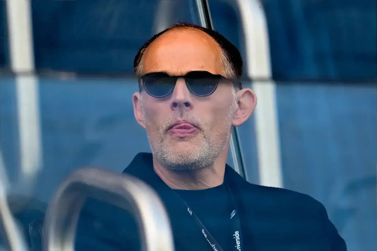 Man with sunglasses watching from a balcony Man with sunglasses watching from a balcony