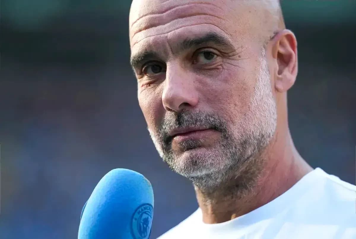Manager speaking into microphone during interview Manager speaking into microphone during interview