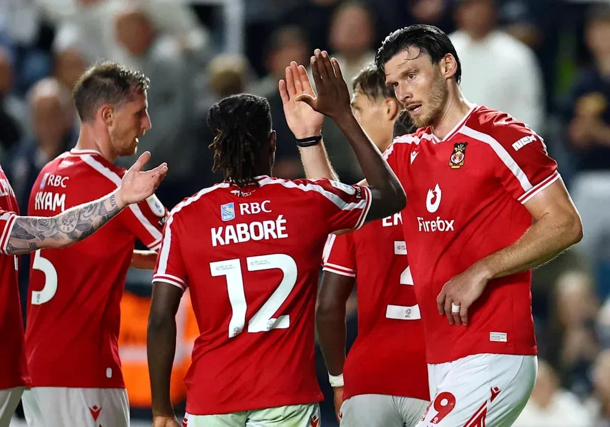 Players celebrating a goal during football match Players celebrating a goal during football match
