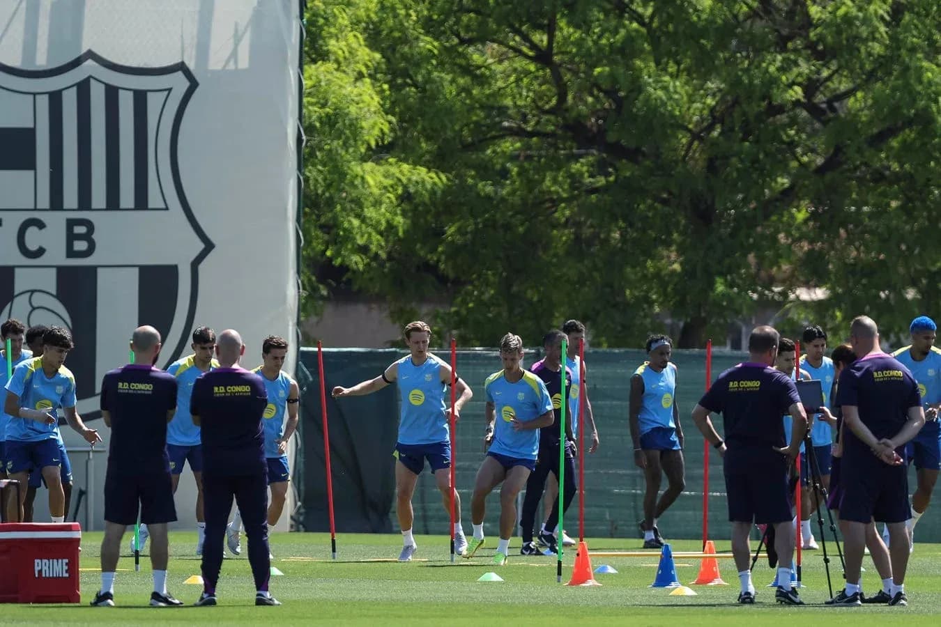 Barcelona players training with cones and markers Barcelona players training with cones and markers