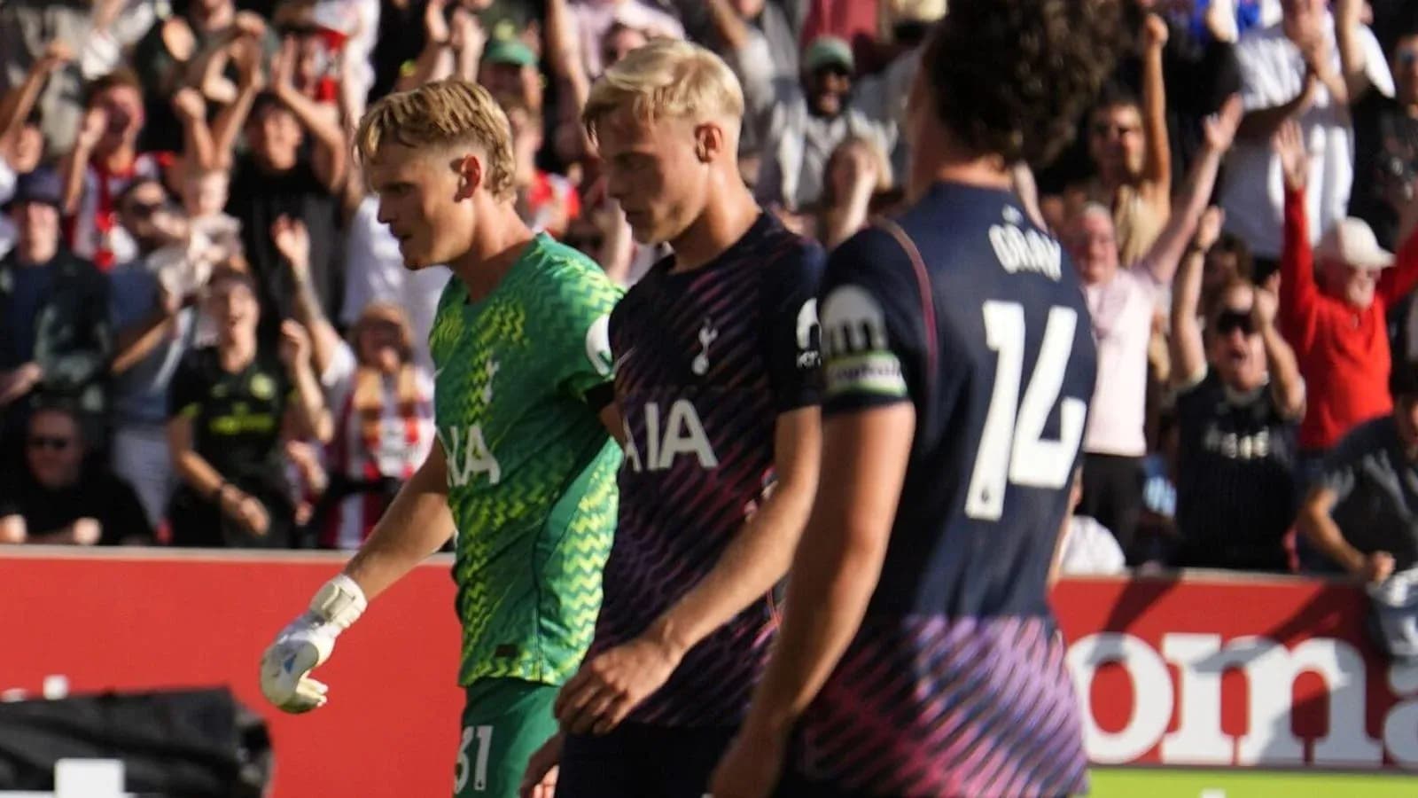 Tottenham players walking off the pitch after match Tottenham players walking off the pitch after match