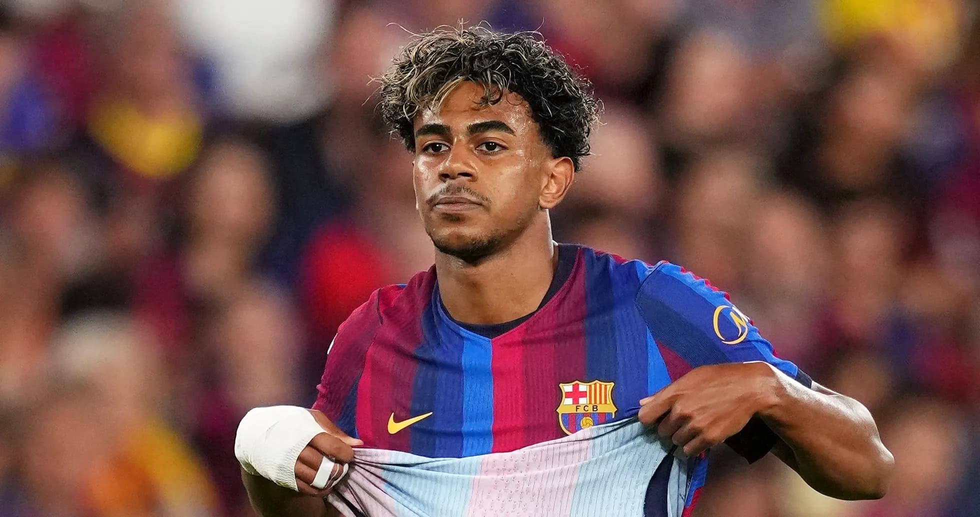 Player removing jersey during match at Camp Nou Player removing jersey during match at Camp Nou