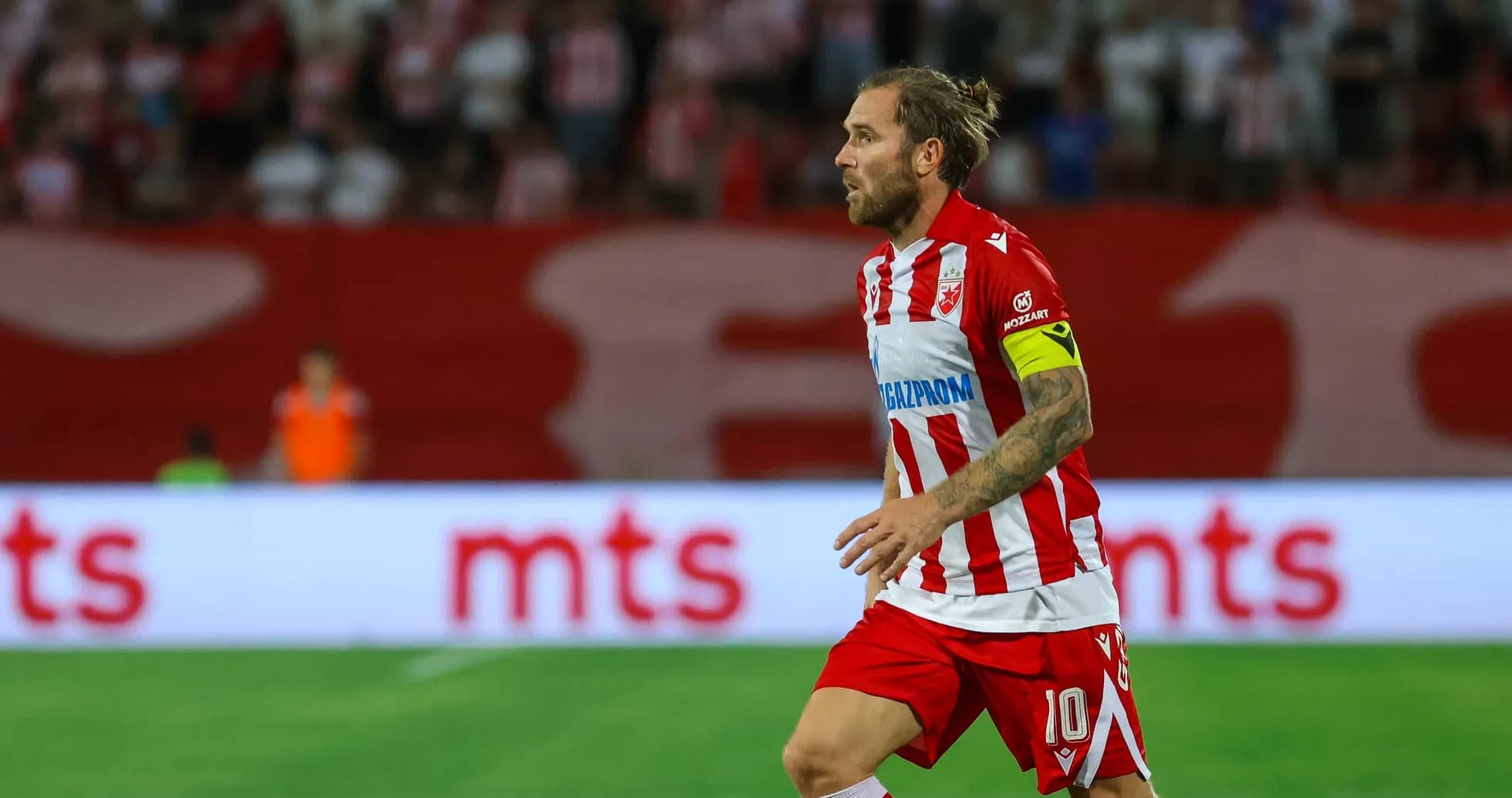 Player running during FK Crvena Zvezda match Player running during FK Crvena Zvezda match