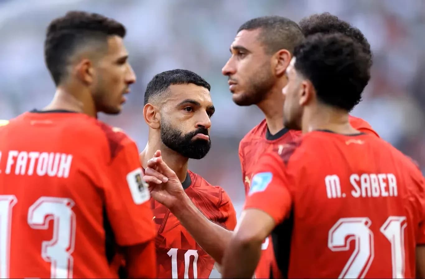 Egyptian players discussing strategy during match Egyptian players discussing strategy during match