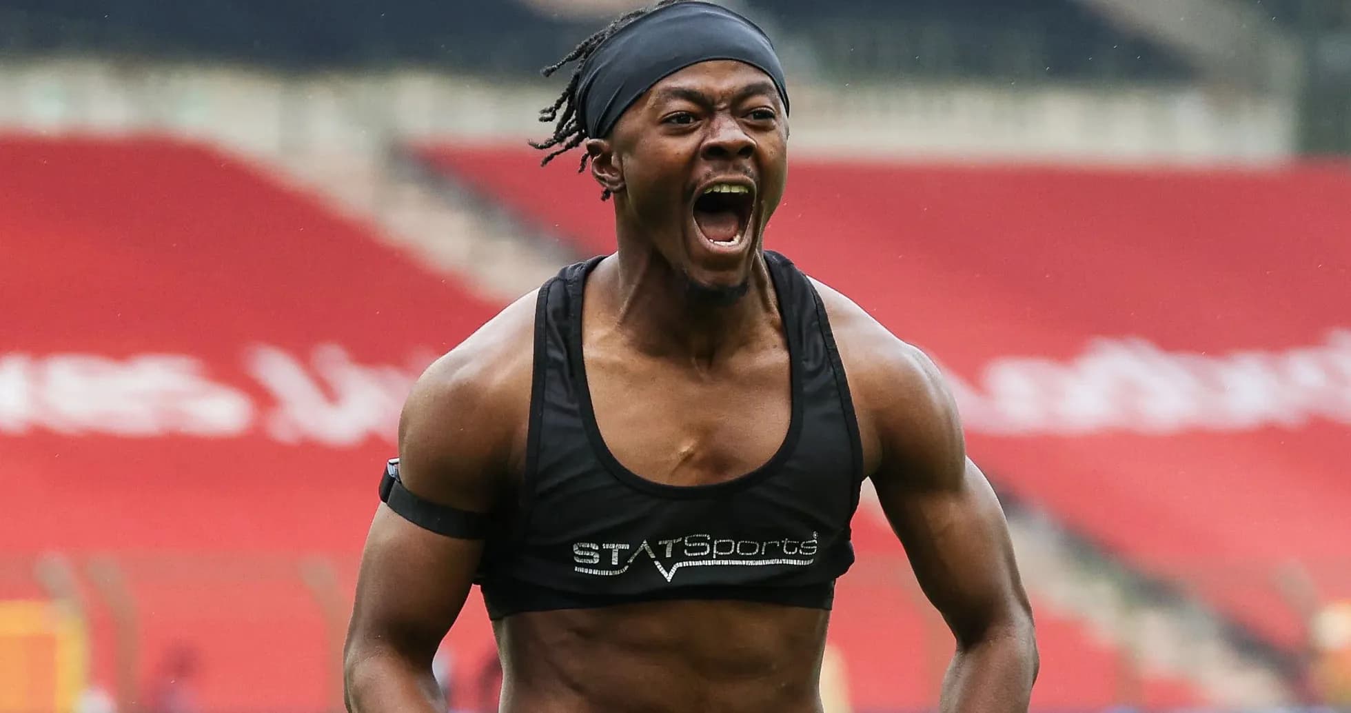 Athlete celebrating on the pitch during training Athlete celebrating on the pitch during training