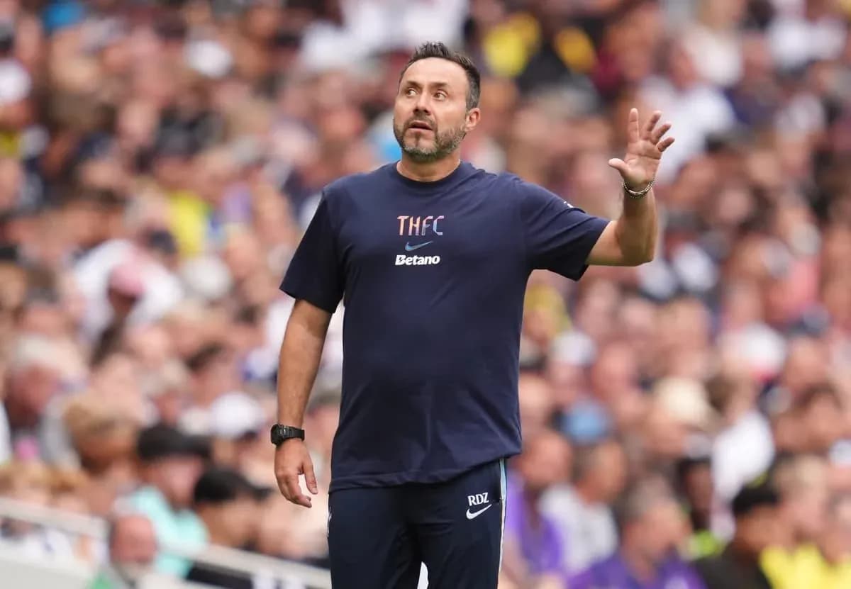Coach gesturing during a match at stadium Coach gesturing during a match at stadium