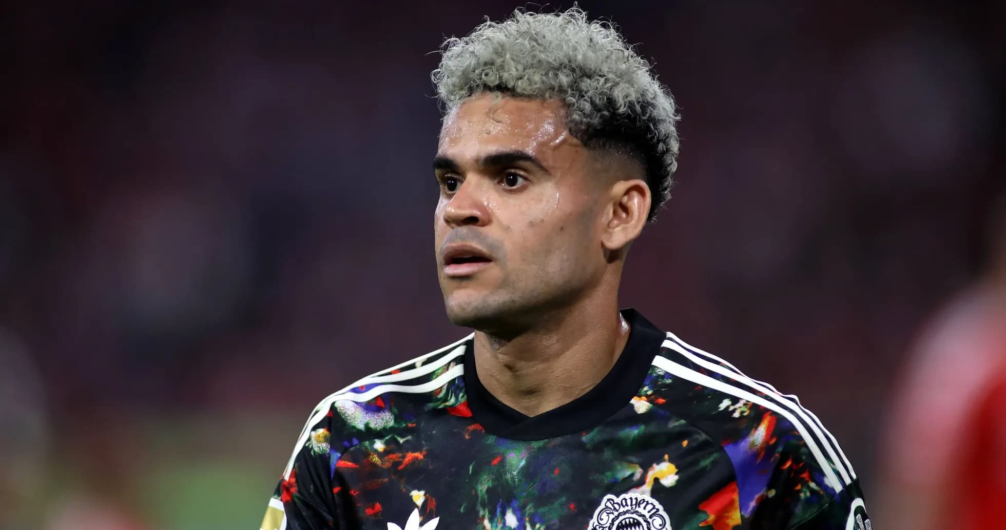 Player in colorful jersey during match action Player in colorful jersey during match action