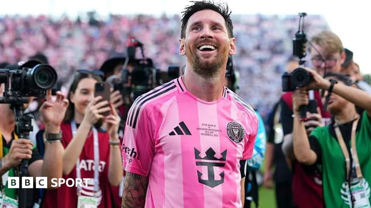 Lionel Messi smiling in pink Inter Miami jersey Lionel Messi smiling in pink Inter Miami jersey