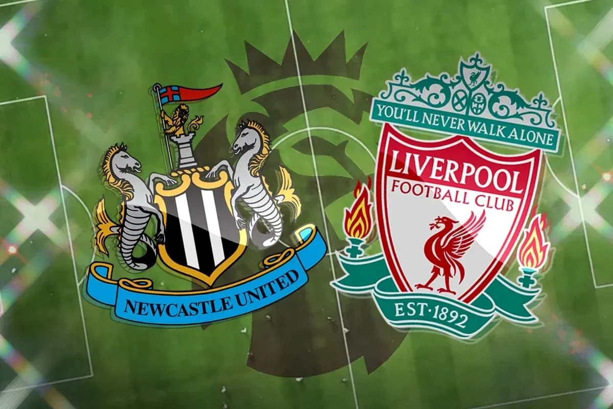 Newcastle United and Liverpool club logos on pitch Newcastle United and Liverpool club logos on pitch