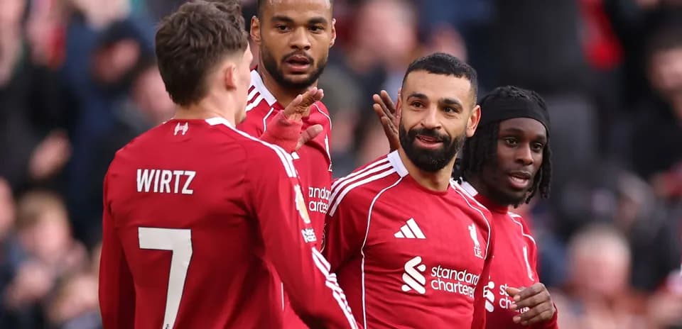 Liverpool players celebrating a goal during match Liverpool players celebrating a goal during match