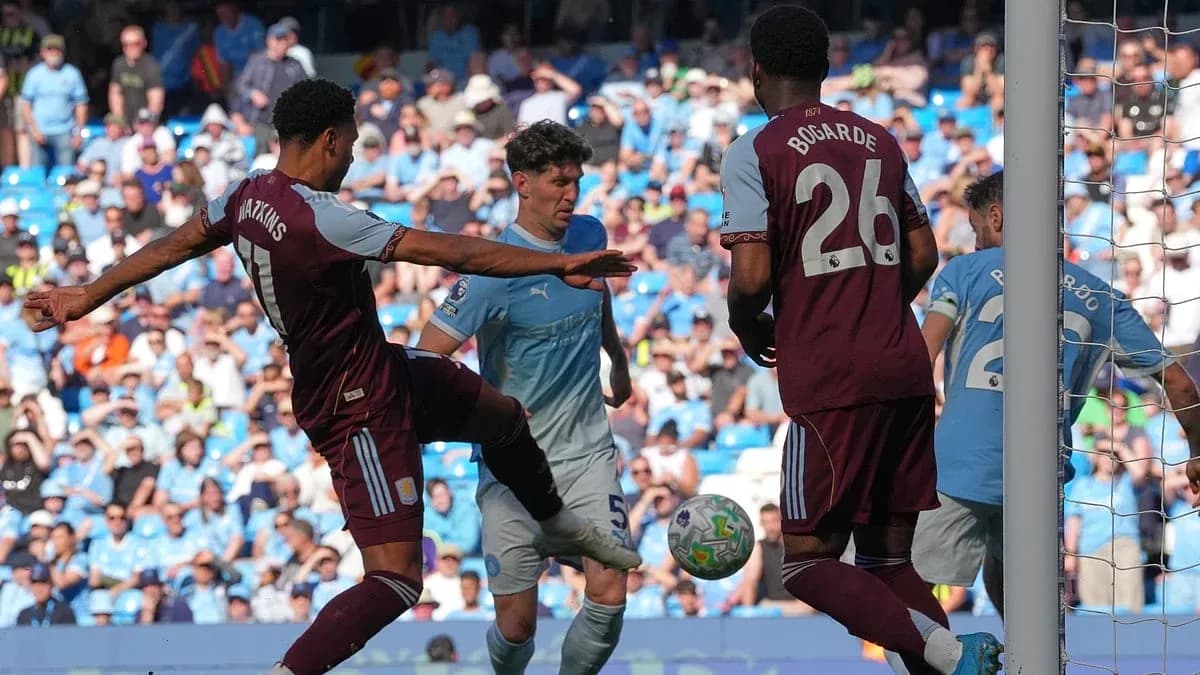 Watkins attempts to score against Manchester City Watkins attempts to score against Manchester City