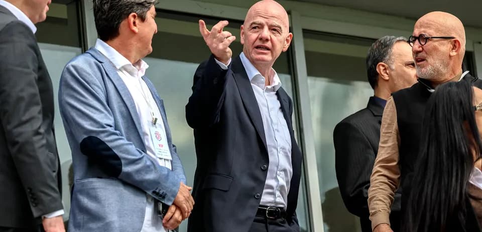 Officials discussing during an event at stadium Officials discussing during an event at stadium