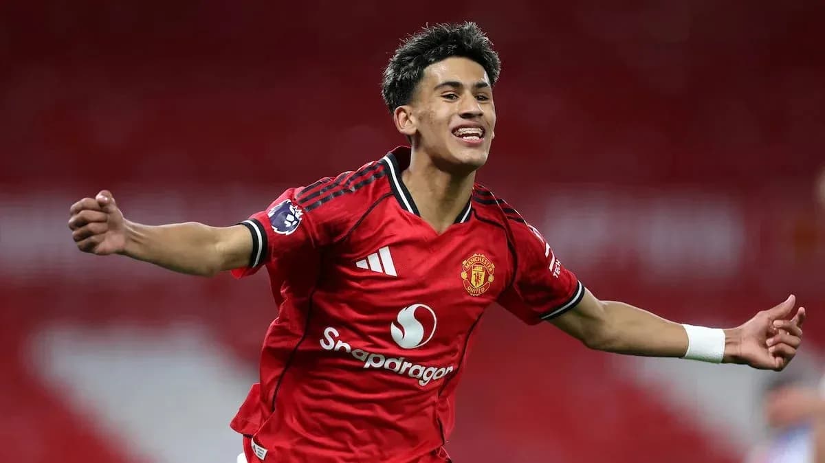 Player celebrating a goal in Manchester United jersey Player celebrating a goal in Manchester United jersey