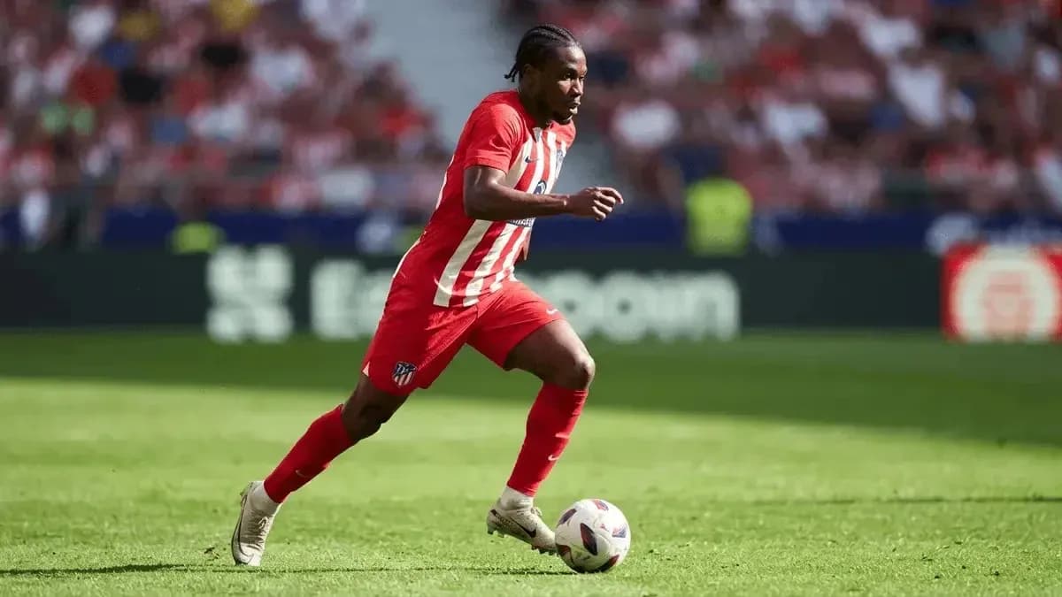 Player dribbling ball during a match Player dribbling ball during a match