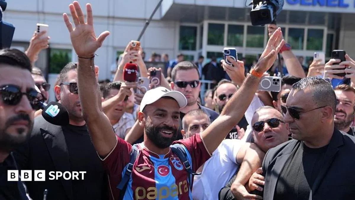 Player greeting fans outside club facility Player greeting fans outside club facility