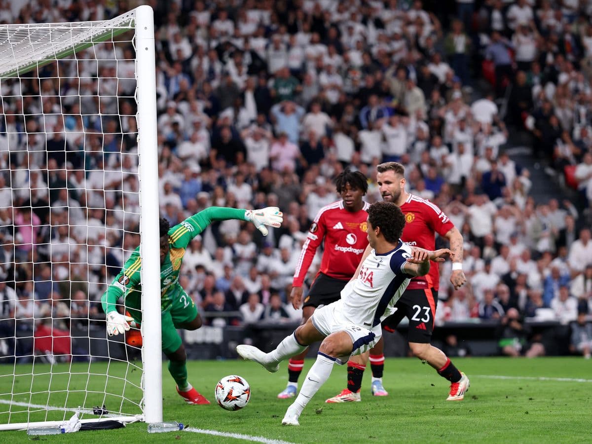 Players celebrating after a goal in the match. Players celebrating after a goal in the match.