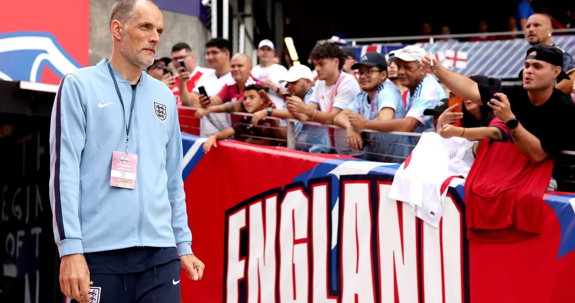 Manager walking past fans before the match Manager walking past fans before the match