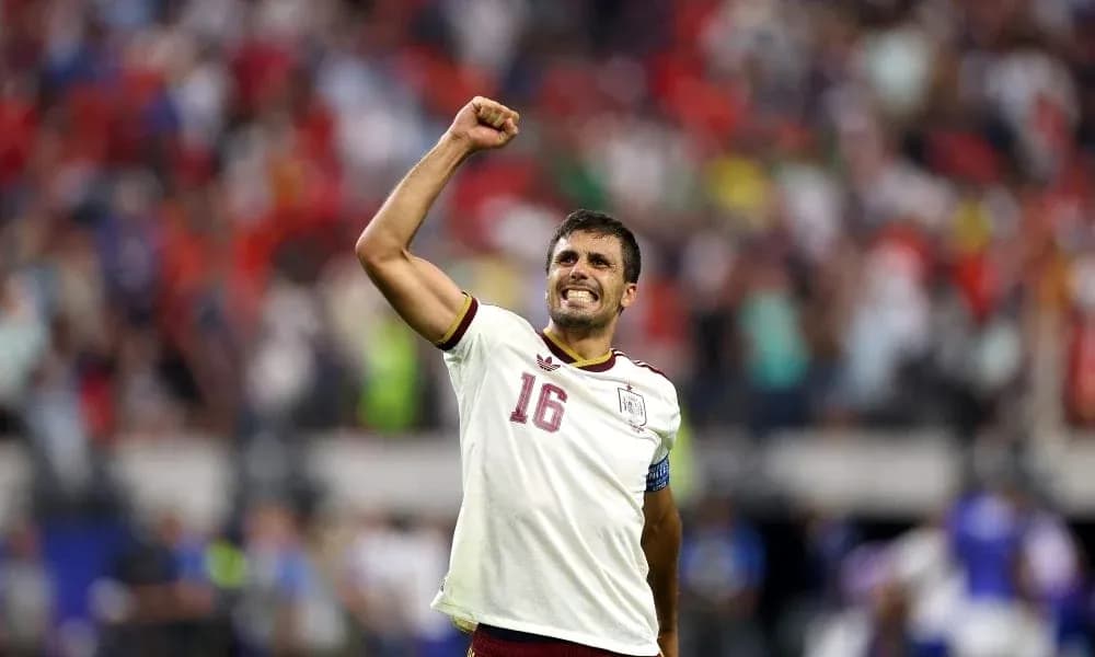 Player celebrating with raised fist during match Player celebrating with raised fist during match