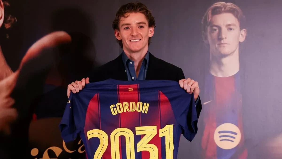 Player holding FC Barcelona jersey with name and number Player holding FC Barcelona jersey with name and number