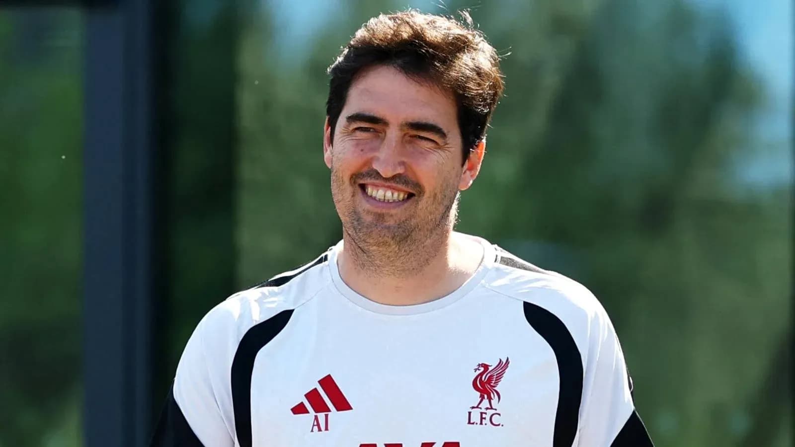 Coaching staff member at Liverpool training session Coaching staff member at Liverpool training session