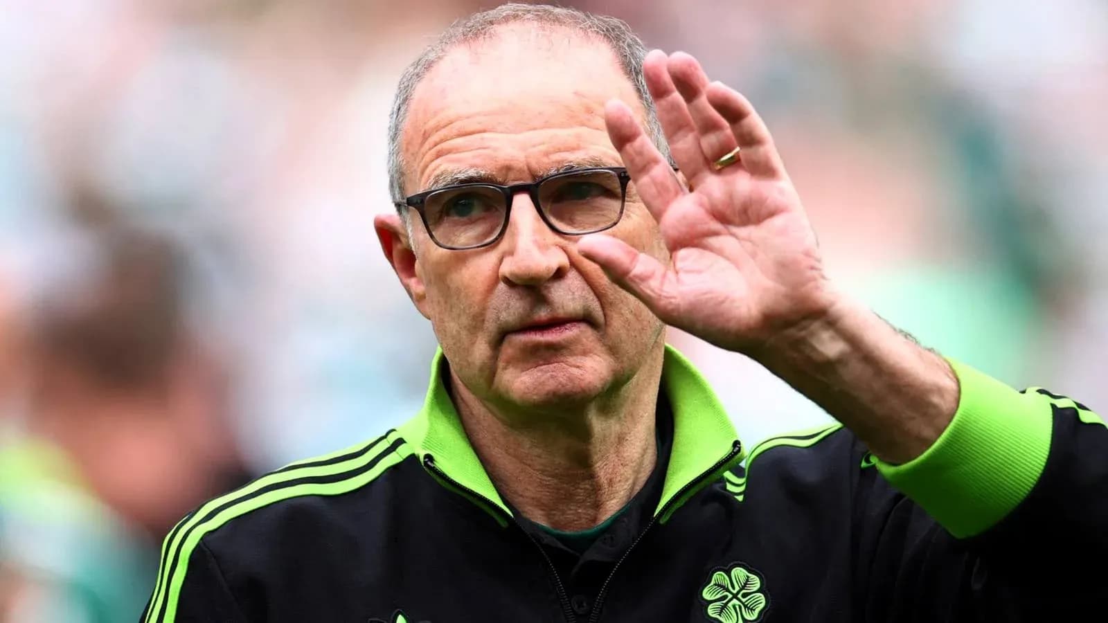 Manager waving during match at stadium Manager waving during match at stadium
