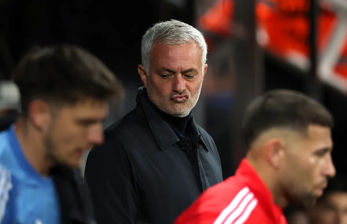 Manager observing players on the sidelines during match Manager observing players on the sidelines during match
